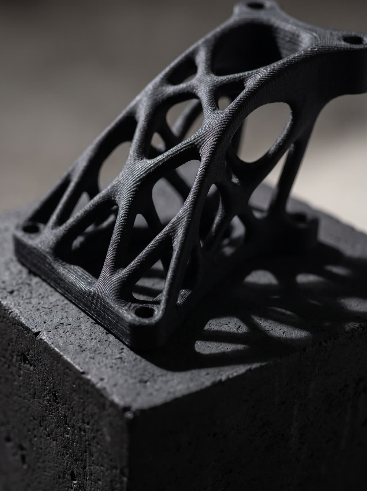 Soporte con estructura topológica optimizada impreso en 3D